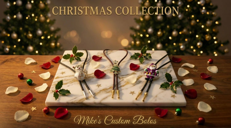 Festive Christmas bolo ties featuring snowmen, trees, and Santa designs displayed on marble for Mike's Custom Bolos.