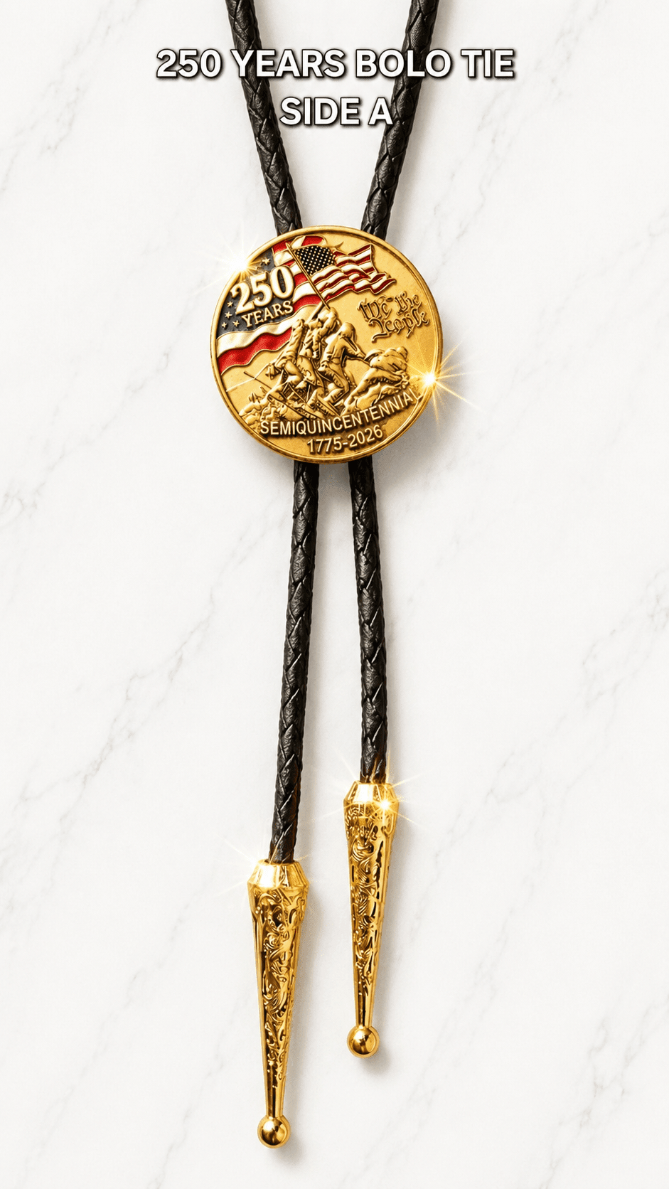 250 Years Bolo Tie Side A featuring a patriotic flag-raising centerpiece, black braided leather, ornate gold-tone filigree tips, and 250 Years Bolo Tie Side A lettering on white marble