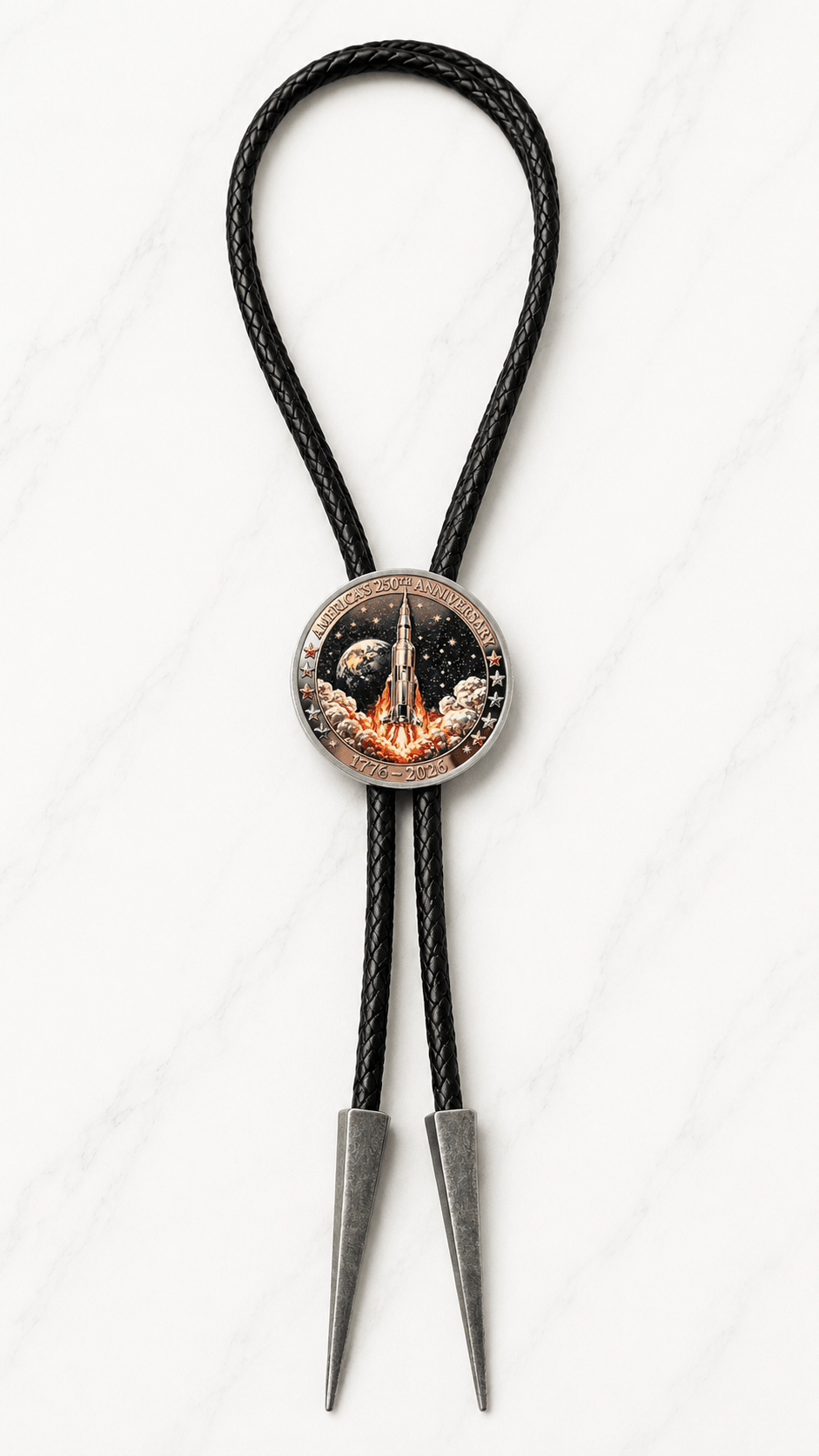 Enduring Freedom Bolo Tie reverse side with America’s 250th Anniversary rocket launch centerpiece, black braided leather, and dark silver-tone bolo tips