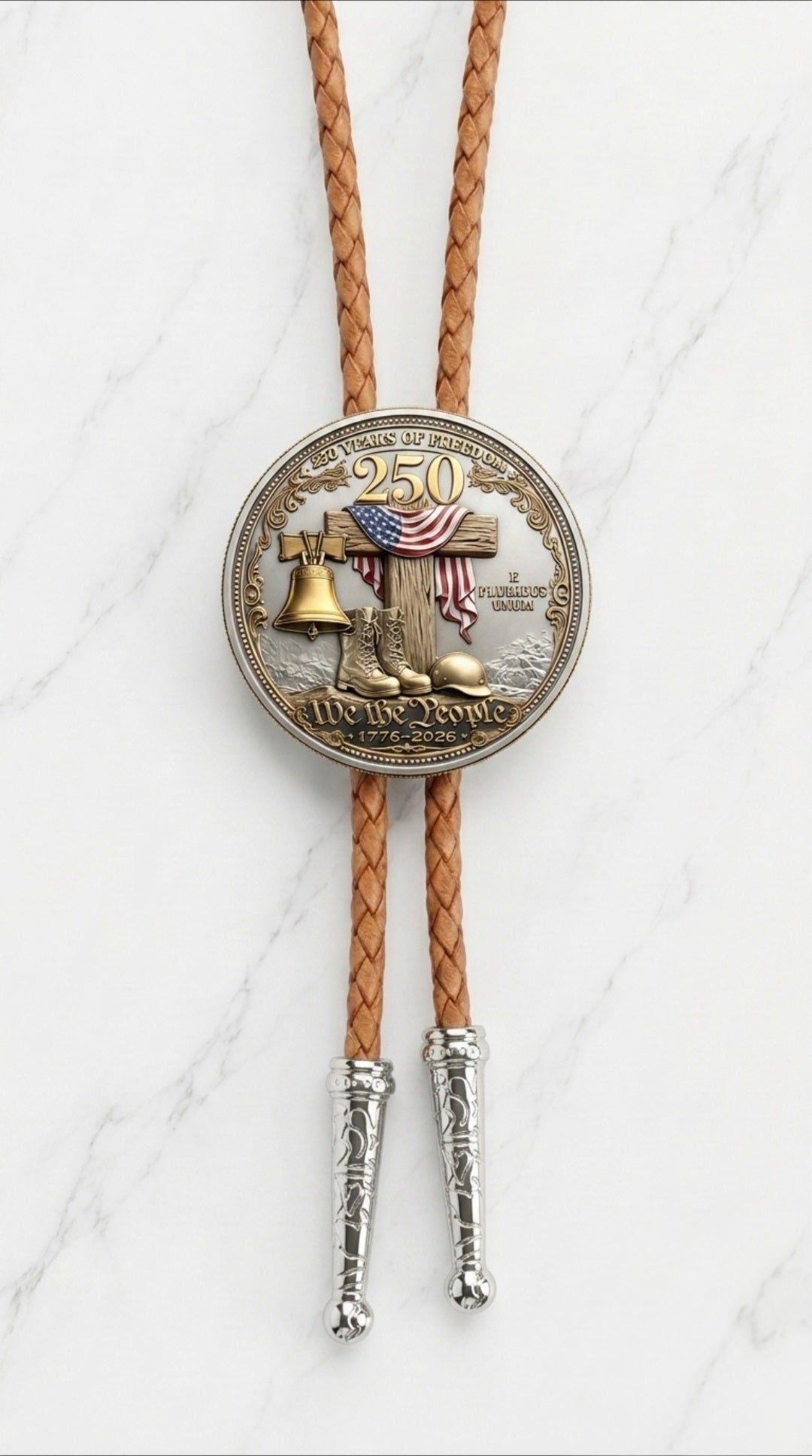 Honoring Our Veterans Bolo Tie Side A with Liberty Bell, American flag, military boots, helmet, We The People centerpiece, brown braided leather, and polished silver ornate tips